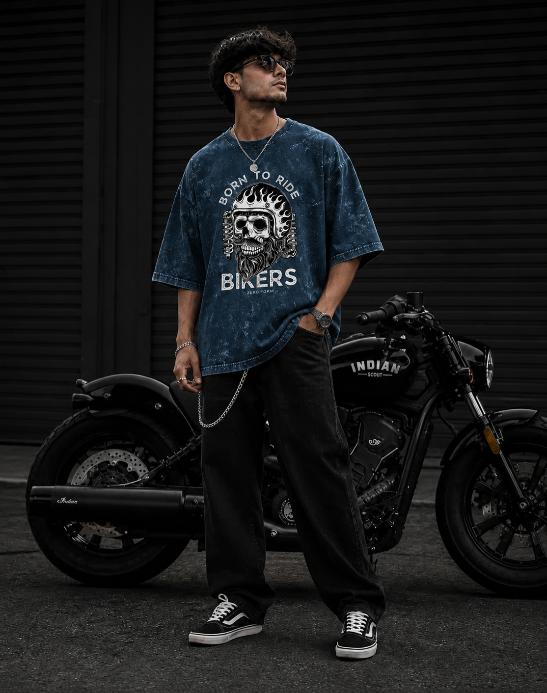 Zerofrom Born to Ride Oversized | 100% Cotton Acid Wash Person wearing a 'Born to Ride Bikers' t-shirt standing next to an Indian motorcycle.