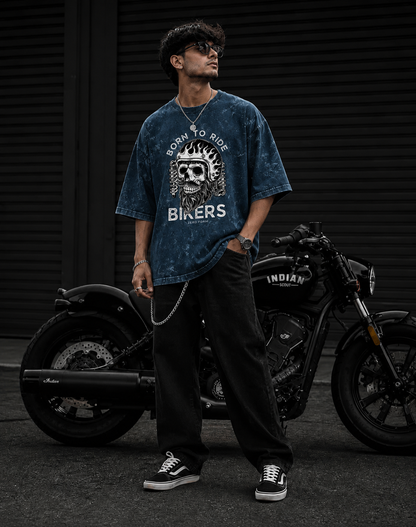 Zerofrom Born to Ride Oversized | 100% Cotton Acid Wash Person wearing a 'Born to Ride Bikers' t-shirt standing next to an Indian motorcycle.