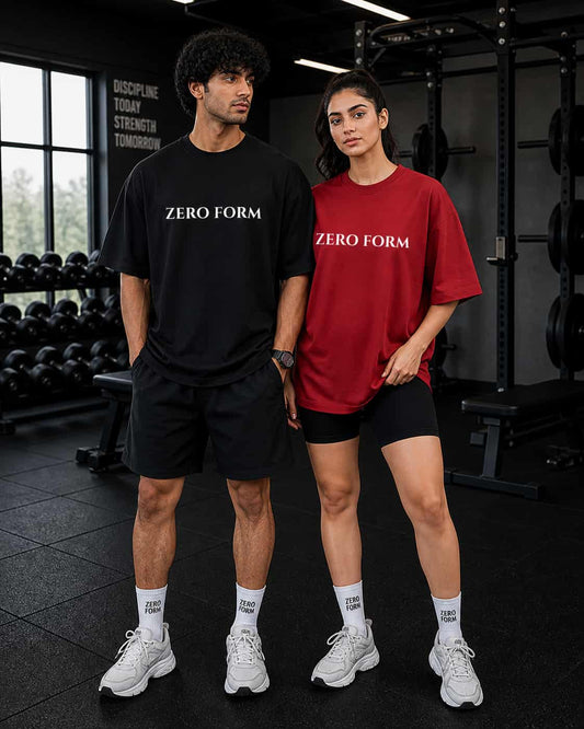 Two people wearing 'Zero Form' t-shirts in a gym setting